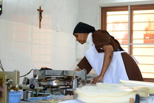 Carmelite Sisters making communion bread